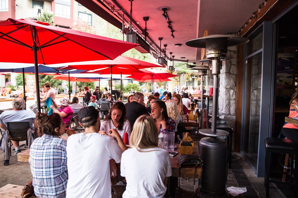 People eating on a patio in Whistler