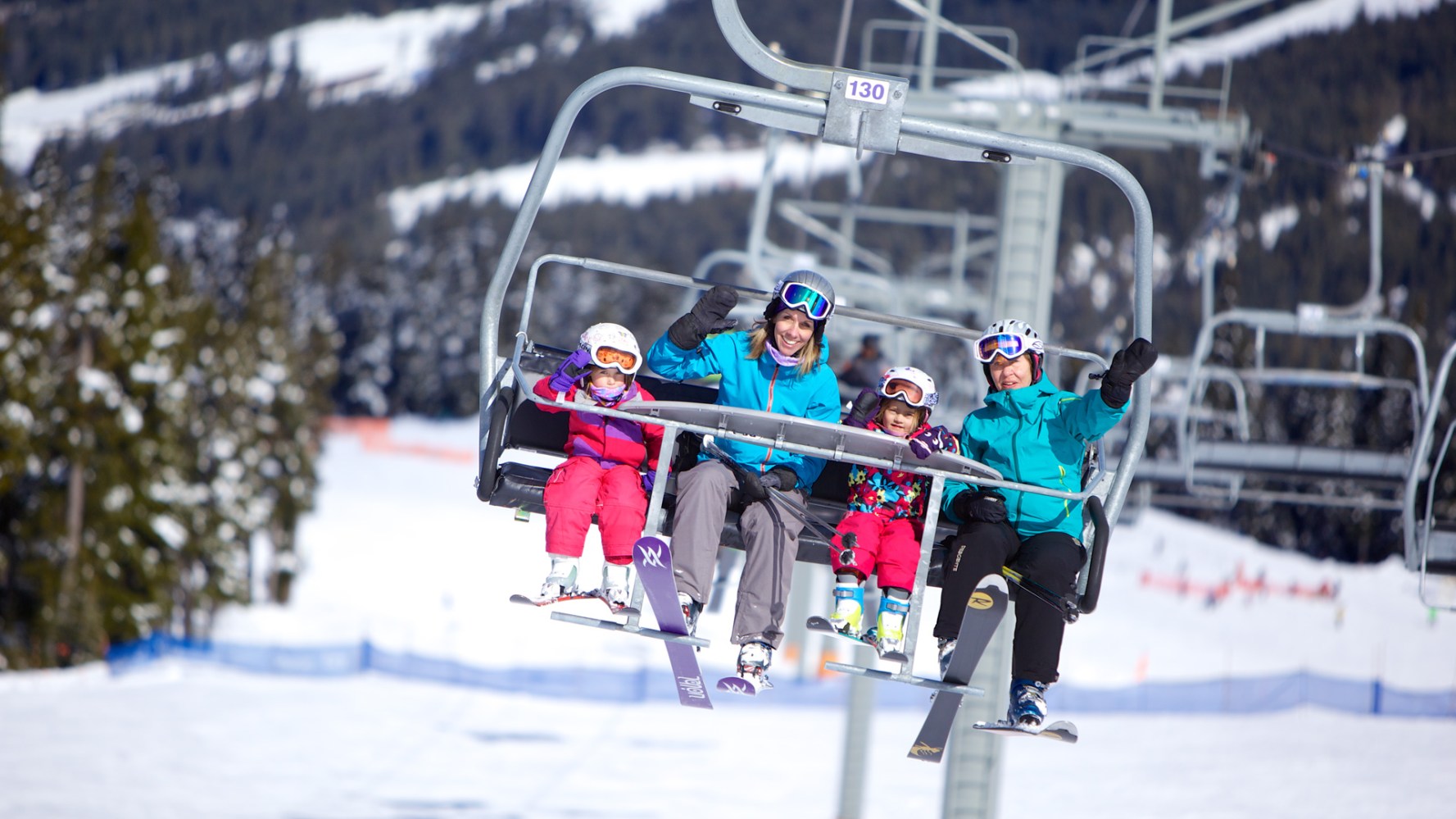 Family on a ski lift