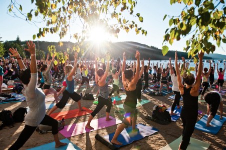 Hundreds of Yogi at a lake
