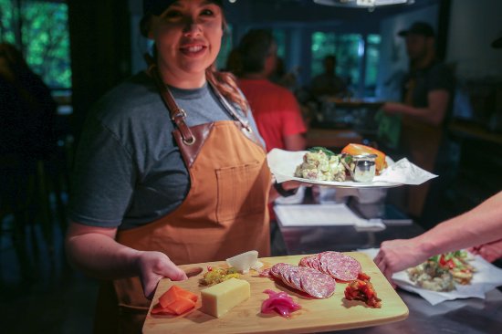 Hunter Gather staff holding a plate