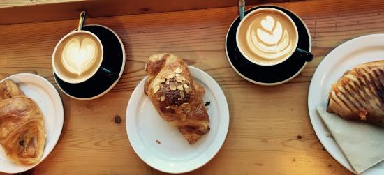 latte's and coffees on a table