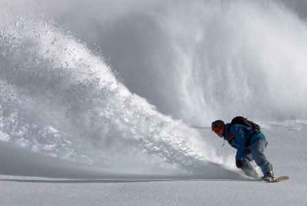 Man on snowboard on the slopes of Whistler