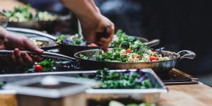 A chef preparing a plant-based dish