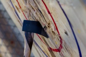 Axe head buried into a target at BATL