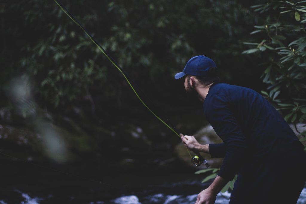 Man fly fishing on a river