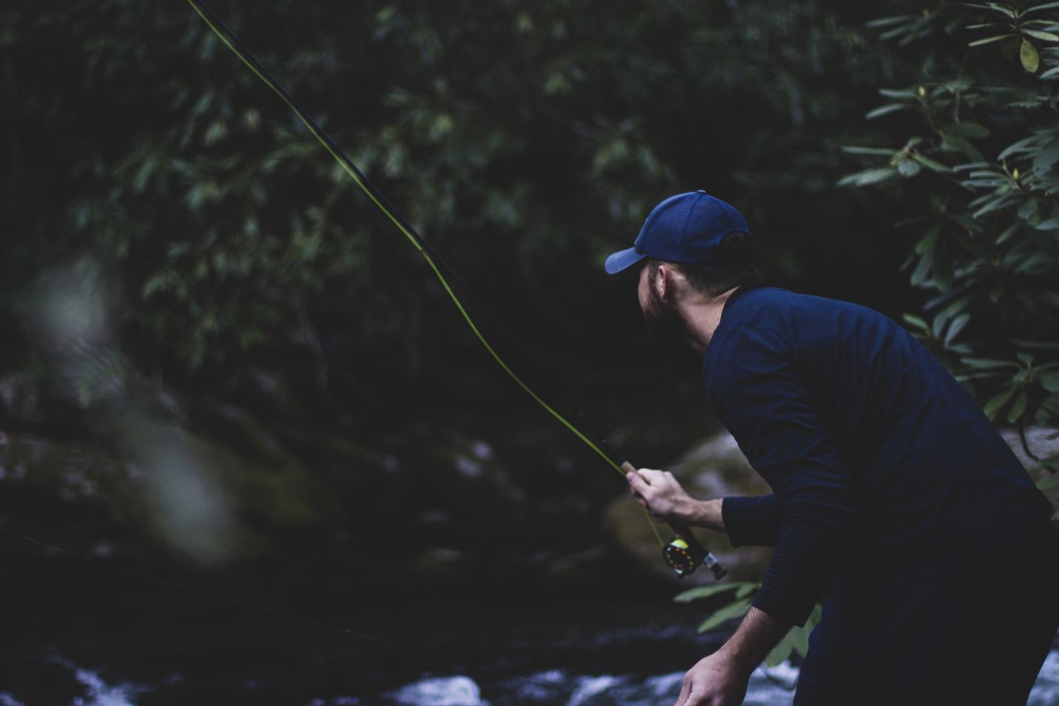 Man fly fishing on a river