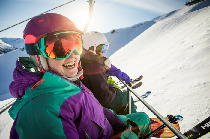 Two women on a ski lift in Whistler
