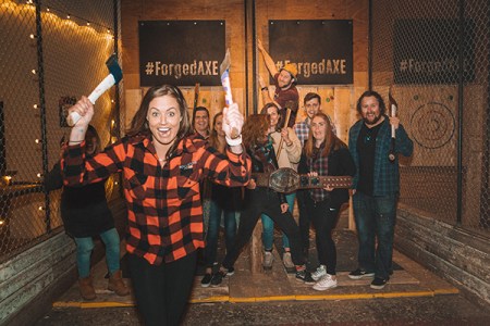 Lady excited to throw axes at Forged