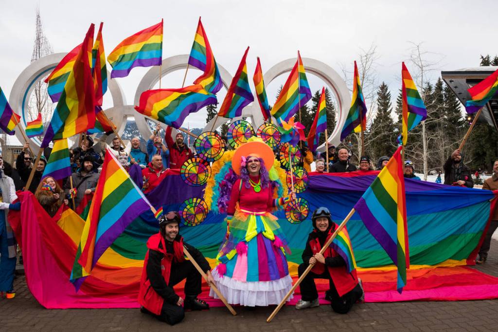 Whistler Pride and Ski Festival 2019, group of partiers with a drag queen