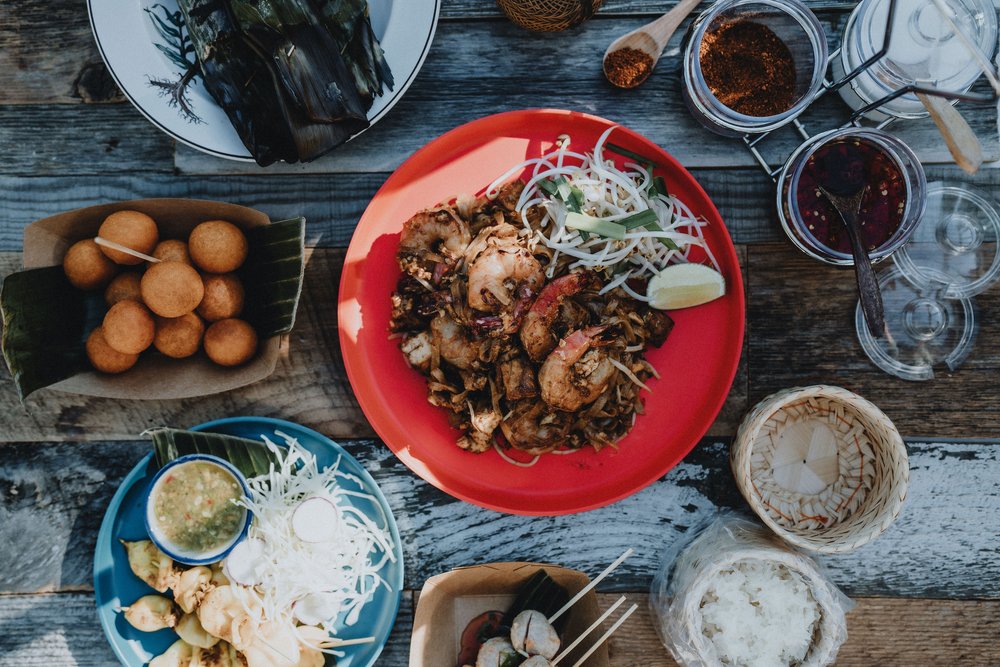 a table topped with different types of food on a plate