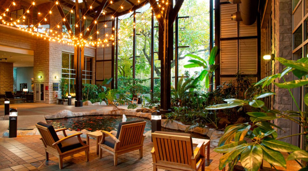 a dining room table in front of a window